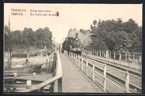 AK Tamise, Un train sur le pont