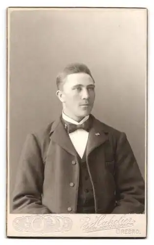 Fotografie Bernhard Hakelier, Örebro, königliches Wappen und Medaillen