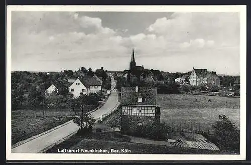 AK Neunkirchen / Köln, Strasse am Ortsrand zur Kirche