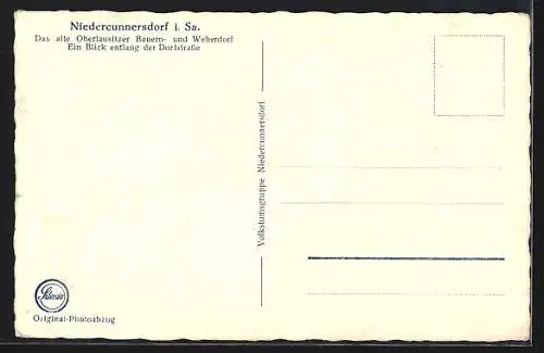 AK Niedercunnersdorf i. Sa., Blick entlang der Dorfstrasse
