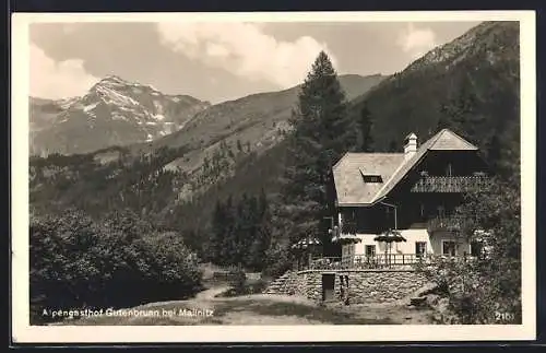 AK Mallnitz, Alpengasthof Gutenbrunn mit Gebirgswand