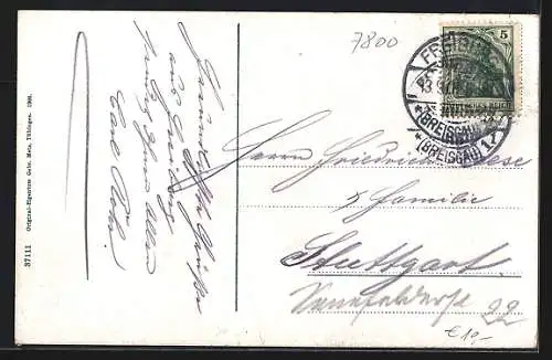 AK Freiburg i. B., Partie beim Siegesdenkmal mit Strassenbahn