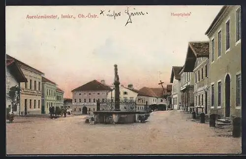 AK Aurolzmünster /Innkr., Hauptplatz mit Gasthaus Lughofer und Brunnen