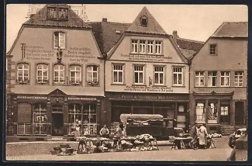 AK St. Wendel, Häuser mit Bekenntnissprüchen am Domplatz mit Geschäften