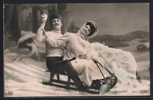 AK Junges Paar auf einem Schlitten