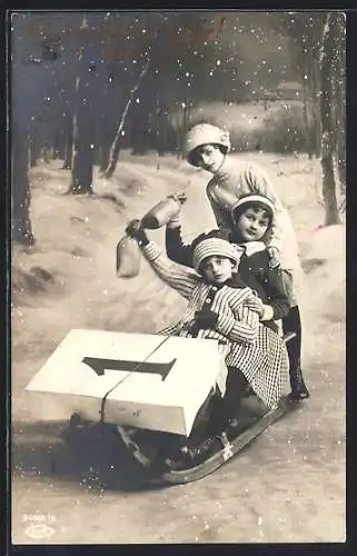 AK Kinder auf einem Schlitten begrüssen das neue Jahr