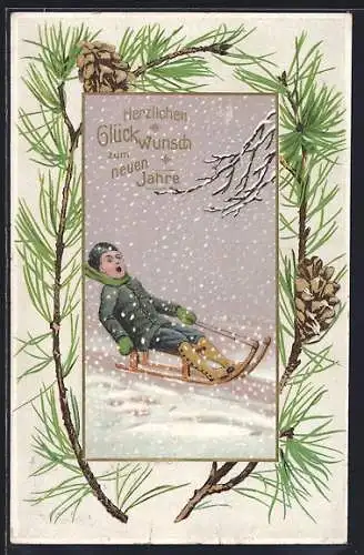 AK Junge im Schnee auf einem Schlitten