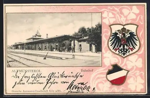 Präge-AK Altmünsterol, Bahnhof im Passepartout mit Wappen und Kleeblättern
