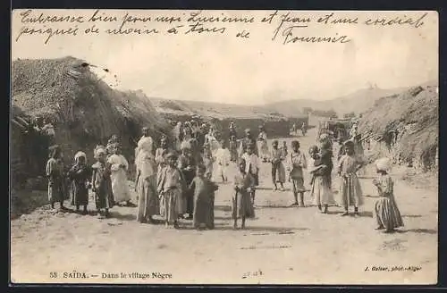 AK Saida, Dans le village Nègre