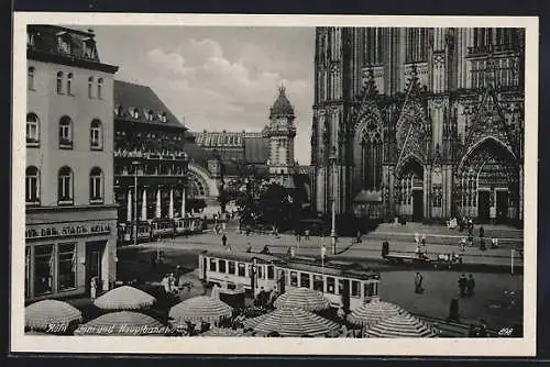 AK Köln, Strassenbahn passiert Dom und Hauptbahnhof