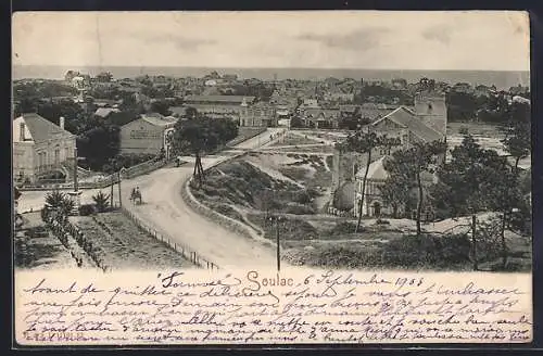 AK Soulac, Vue générale du village avec route principale et église