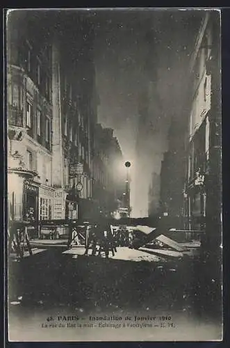 AK Paris, Inondation de janvier 1910, La rue du Bac la nuit éclairée à acétylène