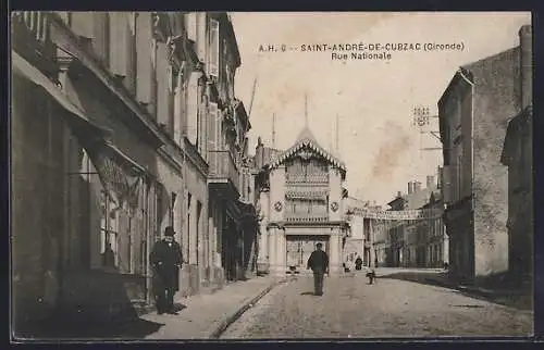 AK Saint-André-de-Cubzac, Rue Nationale animée avec passants et bâtiments historiques