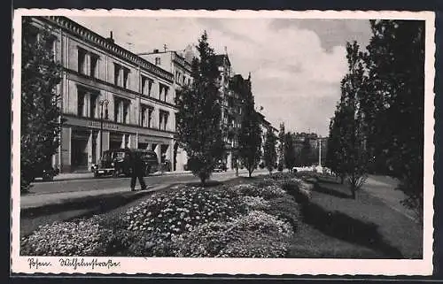 AK Posen, Wilhelmstrasse mit Autos