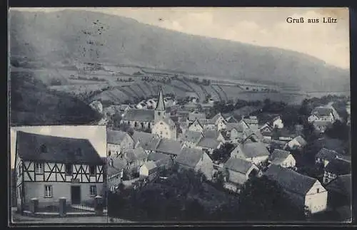 AK Lütz, Fachwerkhaus, Ortsansicht vom Berg aus