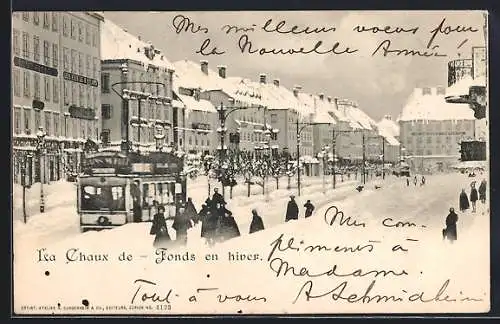 AK La Chaux-de-Fonds, Strassenbahn auf winterlicher Strasse