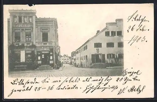 Foto-AK Vilshofen, Strasseneck am Geschäft F. Claudi