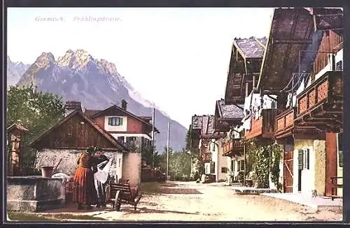 AK Garmisch, Frühlingsstrasse mit Bergen im Hintergrund