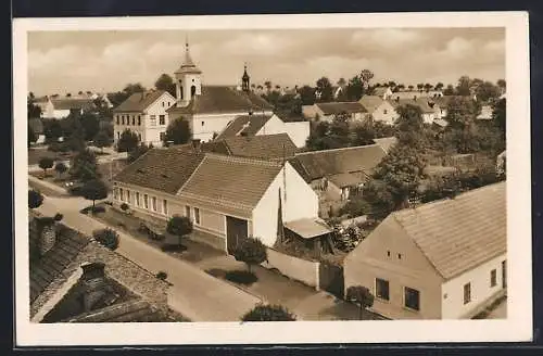 AK Sezimovo Ústí, Wohnhäuser an der Kirche