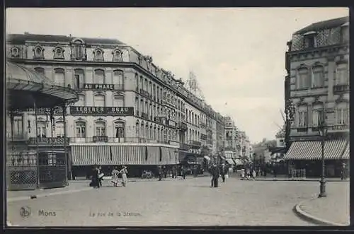 AK Mons, La rue de la Station, Strassenpartie
