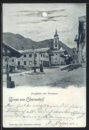 AK Oberaudorf, Dorfplatz mit Brunnen bei Mondschein