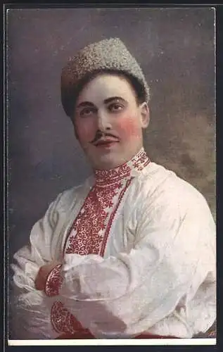 AK Ukrainer im Trachtenhemd mit Pelzmütze, Portrait