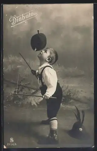 AK Junge spielt mit seinem Diabolo, Spielzeug