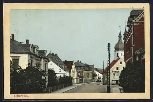 AK Olbernhau, Strassenpartie mit Geschäft Griessig