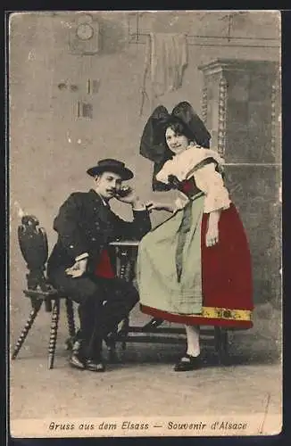AK Elsässer Paar in Trachten am Küchentisch