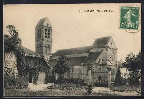 AK Luzarches, L`église et son clocher imposant
