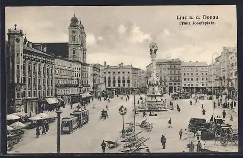 AK Linz a. d. Donau, Franz Josefsplatz mit Denkmal und Strassenbahn