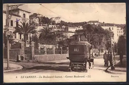 AK Le Cannet, Le Boulevard Carnot mit Strassenansicht und Palmen im Hintergrund