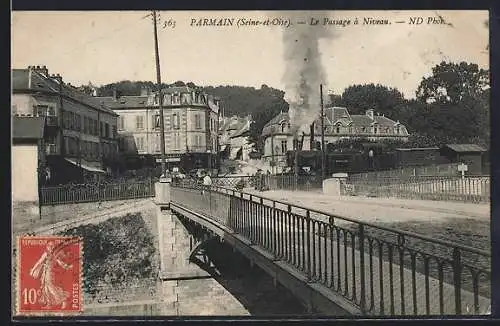AK Parmain, Le Passage à Niveau