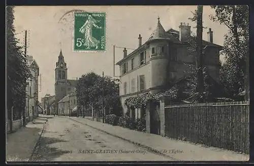 AK Saint-Gratien, Vue de l`église et de la rue principale