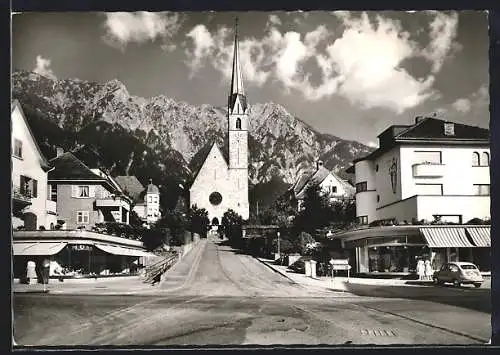 AK Schaan, Strassenpartie mit Blick zur Laurentiuskirche