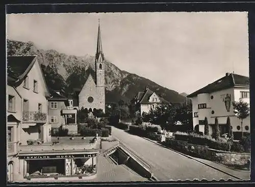 AK Schaan, Laurenziuskirche mit Teppichgeschäft und Fürstensteig