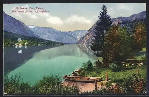 AK Wocheiner See /Krain, Ortsansicht mit Kahn