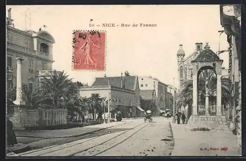 AK Nice, Rue de France avec architecture et végétation