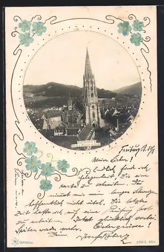 Präge-AK Freiburg i. B., Blick auf Münster und Stadt, Passepartout mit Blumen