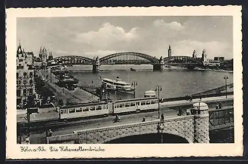 AK Köln a. Rh., Hohenzollernbrücke mit Strassenbahn