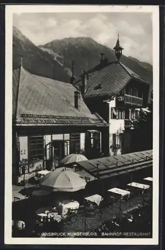 AK Innsbruck-Hungerburg, Partie aus dem Bahnhof-Restaurant mit Blick in den Sommergarten, Alpenmassiv