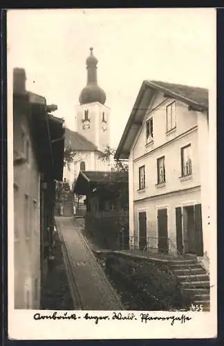 AK Arnbruck /bayer. Wald, Pfarreigasse mit Kirche