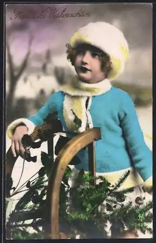 AK Kind in winterlicher Kleidung mit Schlitten, Weihnachtsgruss