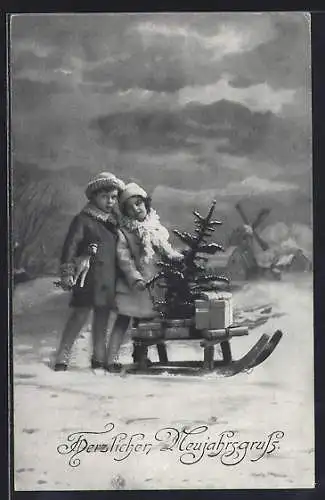 AK Kinderpaar mit Tannenbaum auf Schlitten, Im Hintergrund Windmühle, Neujahrsgruss