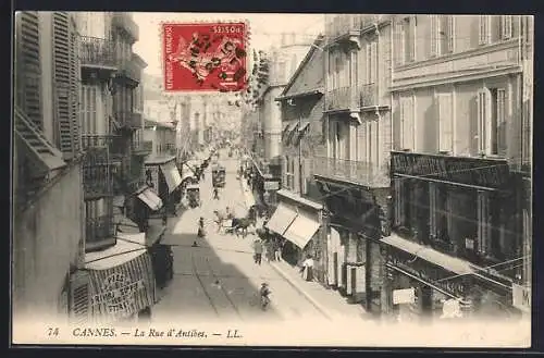 AK Cannes, La Rue d`Antibes animée avec passants et boutiques