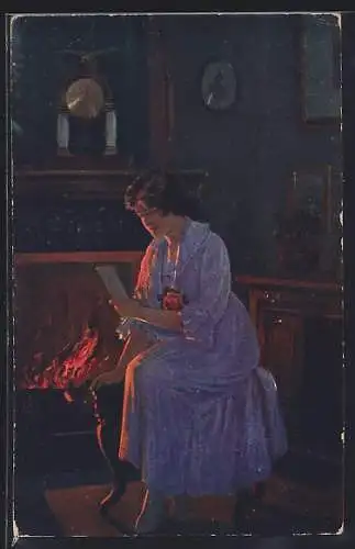 Künstler-AK sign. L. Winter: Frau mit einem Foto am Kamin