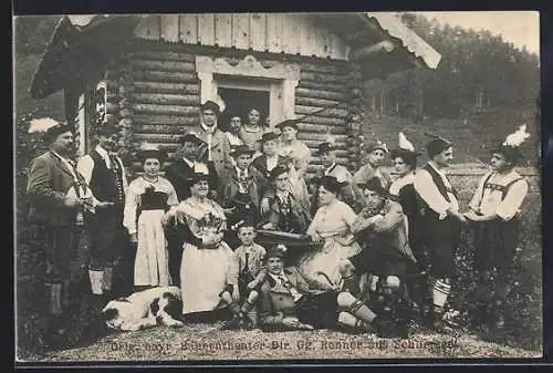 AK Schliersee, Bayr. Bauerntheater Gg. Renner, Gruppenbild vor einem Blockhaus