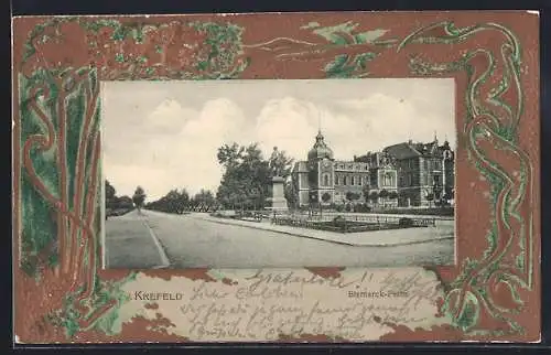Präge-AK Krefeld, Bismarckplatz mit Strasse u. Turmgebäude, Florale Ornamente