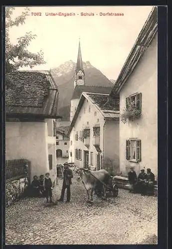 AK Schuls, Dorfstrasse mit Ochsenwagen