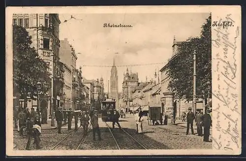 AK Krefeld, Rheinstrasse mit Strassenbahn und Turm